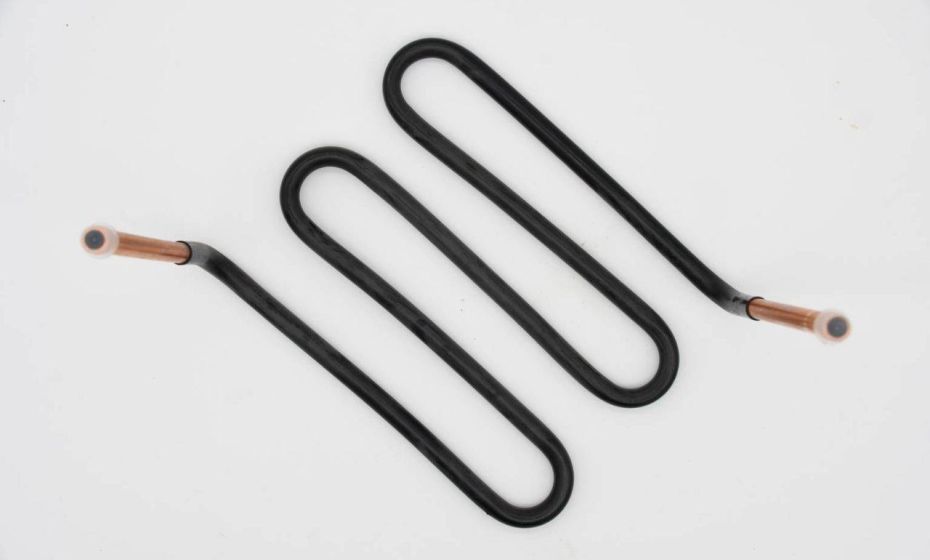 Insulated copper serpentine coil with bent tube geometry, manufactured for HVAC and refrigeration systems.