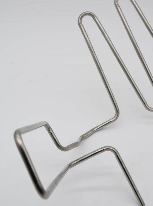 Tubes en acier inoxydable cintrés sur mesure avec géométrie complexe, fabriqués pour des composants de systèmes HVAC et industriels.